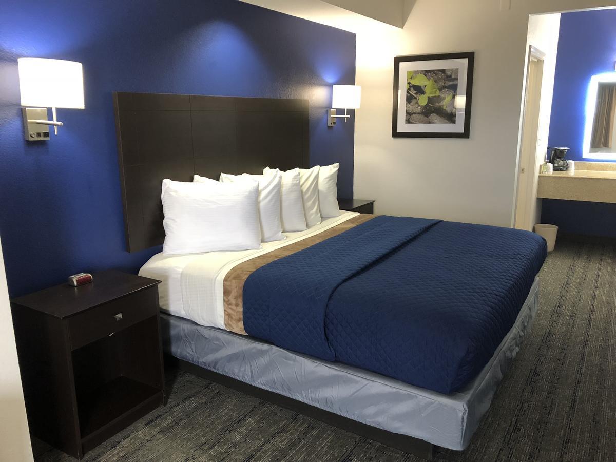 Executive Inn And Suites Joaquin Εξωτερικό φωτογραφία